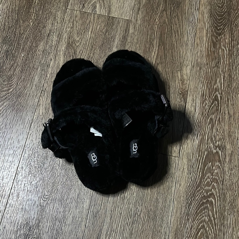 Black UGG furry sandals